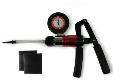 Pressure tester kit with numerous adapters for checking the crankcase of all chainsaws for leaks