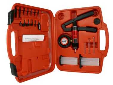 Pressure tester kit with numerous adapters for checking the crankcase of all chainsaws for leaks